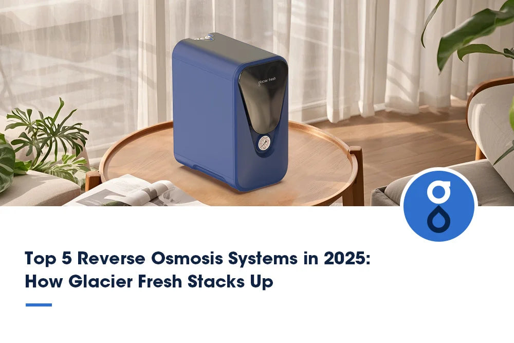 A compact blue reverse osmosis system placed on a wooden table in a bright, modern living space, with the text 'Top 5 Reverse Osmosis Systems in 2025: How Glacier Fresh Stacks Up' displayed below.