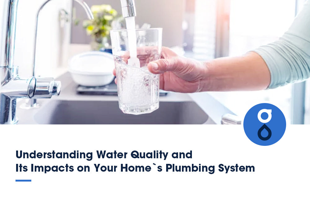 Person filling a glass with tap water, highlighting the importance of understanding water quality and its impact on home plumbing systems