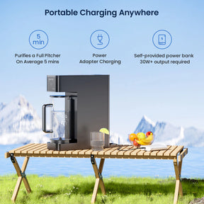 Portable water filter on a wooden table with scenic background