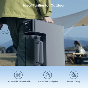Person holding a portable water purifier with camping scene in the background
